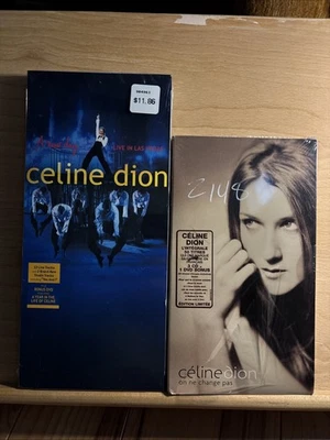 2 SEALED CELINE  DION LONGBOX SETS: On ne change pas, A New Day Live - Image 1 of 2