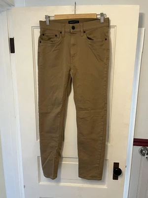 Pantalones de mezclilla chinos elásticos ajustados marrón 30x30 Banana Republic para hombre Foto 1 de 4