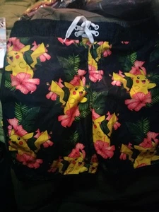  Men’s Pokémon Pikachu Swim Trunks Size 34 Hibiscus Floral Shorts - Picture 1 of 3