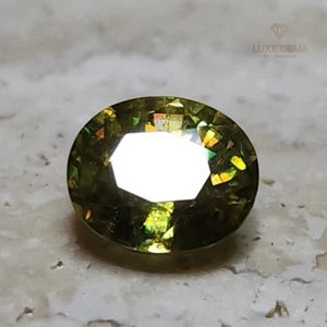 Exceptional 1.575ct Titanite (Sphene) w/ Shifting Green & Yellow & Rainbow Fire! - Picture 1 of 7