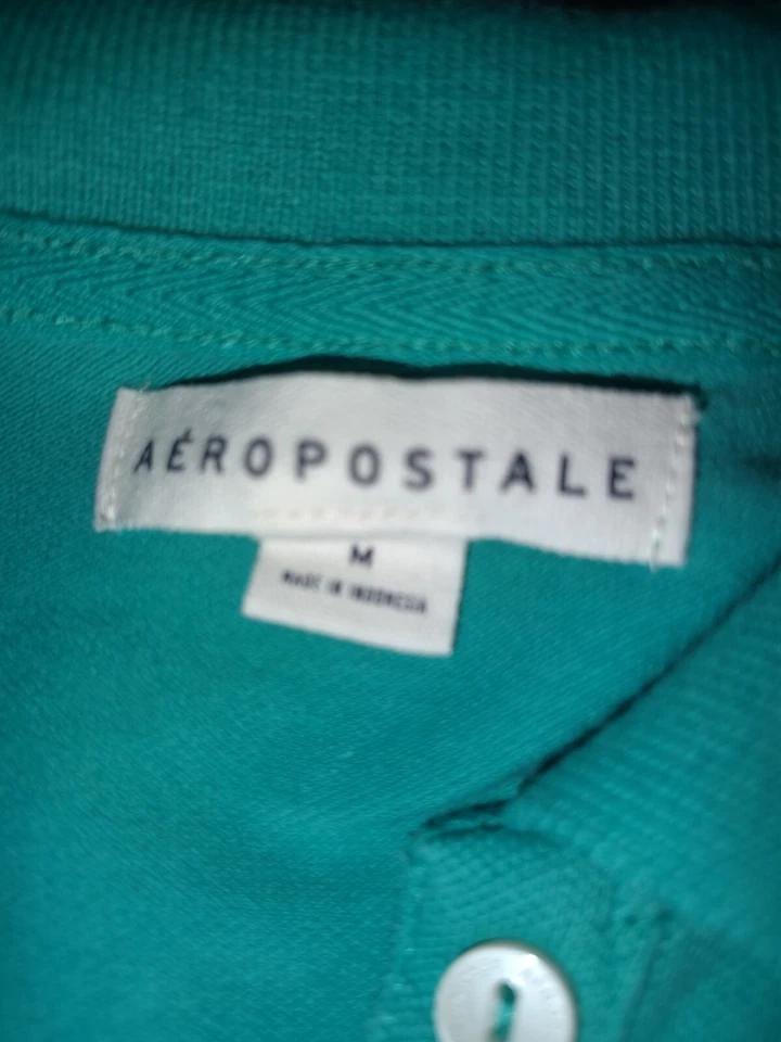 Polo Aeropostale Niñas Talla Med Bordado A87. Aqua Green Foto 1 de 3