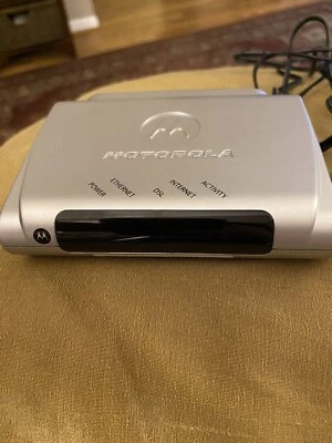 Módem DSL de Internet de alta velocidad Motorola 2210-02-1006, adaptador de fuente de alimentación, cable Foto 1 de 3