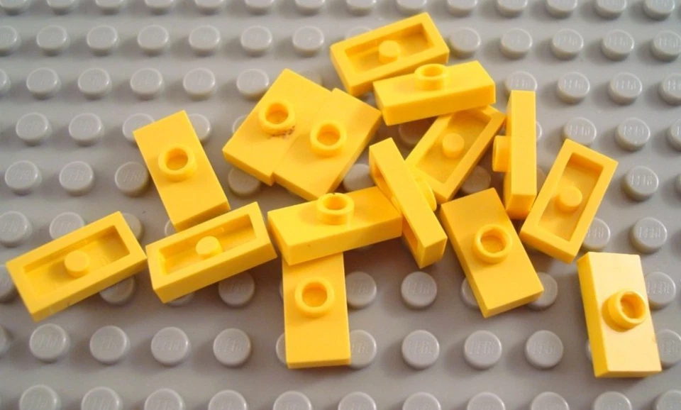 LEGO Lot of 15 Yellow 1x2 1 Stud Plate Parts - Image 1 of 1