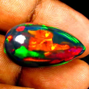 Asombrosa pera cabujón de 13,69 quilates (25 x 13 mm) ópalo negro intermitente etíope - Imagen 1 de 2