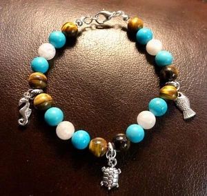 Natural stone. Tigers eye, blue howlite, and moon stone beaded Charm bracelet - Picture 1 of 4