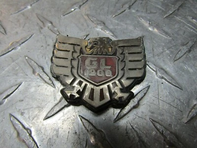84-87 Honda GL1200 GL 1200 Goldwing Side Cover Badge Emblem B P/N: 83606-MG9-000 - Image 1 of 4
