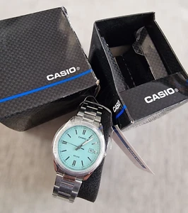 New Casio Aqua Blue Dial 44mm Silver Steel Bracelet Watch • MTP-1302PD-2A2VEF - Picture 1 of 6