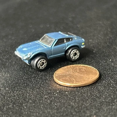 Coche deportivo vintage Micro Machines Datsun 240Z azul negro ventanas LGTI 1994 Foto 1 de 4