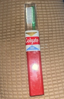 Vintage Colgate Toothbrush in Plastic Case New Old Stock Mint Green - Image 1 of 4