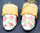Yellow And White Shoe Ornament With Pink Rose Design And Sparkles