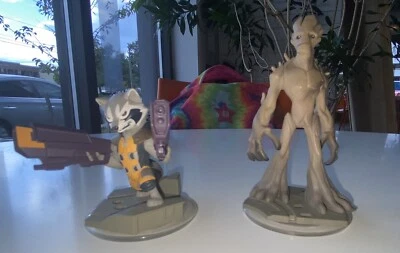 JUEGO DE 2 FIGURAS MAPACHE GROOT Y COHETE DISNEY INFINITY 2.0 Foto 1 de 3