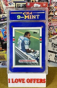 BARRY SANDERS ROOKIE CARD 1989 TOPPS TRADED FOOTBALL RC #83T GRADED CSA 9 LIONS - Picture 1 of 4