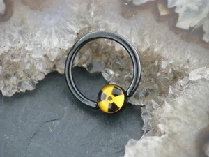 Klemmring ATOM ZEICHEN Lippen Piercing Ohrring Bust Nase Intimpiercing Tragus - Bild 1 von 1