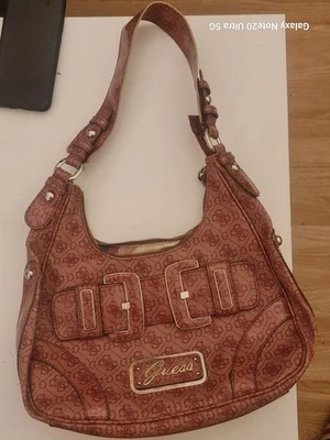 Guess Vegan Leather Pink Shoulder Bag With Zip Front Pocket  An Top Zip Closure. - Image 1 of 4