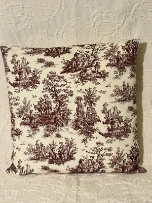 Funda de almohada y almohada con estampado de toile borgoña sobre lona de algodón crema Foto 1 de 4