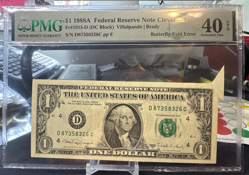🦋  $1 1988A FRN ( CLEVELAND “D”) BUTTERFLY FOLD ERROR  ( PMG 40 EPQ ) - Image 1 of 4