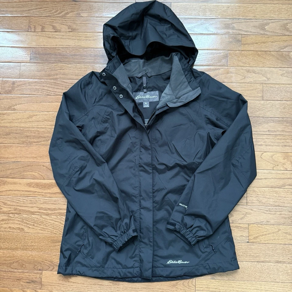 Chaqueta cortavientos Eddie Bauer para mujer M negra borde climático capucha extraíble deportiva Foto 1 de 4