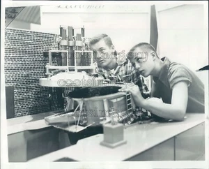 1957 Press Photo 1950s Teen Boys Using Unknown Scientific Device - Picture 1 of 2