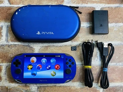 Sony PS Vita PCH-1000 blu zaffiro ZA04 custodia cellulare caricatore 8 GB testato n.2D P - Immagine 1 di 4