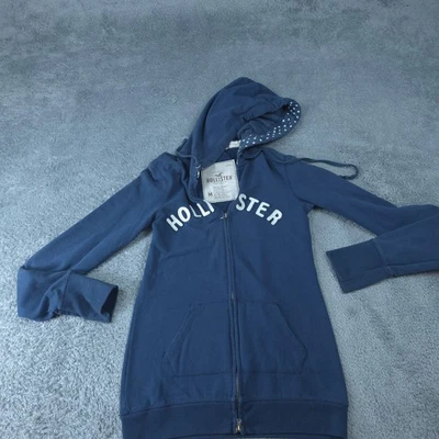 Sudadera con capucha Hollister para mujer azul medio cremallera completa logotipo forrado a lunares Foto 1 de 4