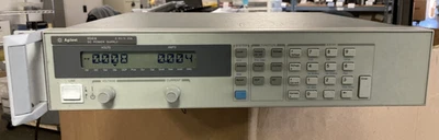 HP Agilent Keysight 6541A DC Power Supply 0-8V / 0-20A w/ One Ear Rack - Image 1 of 4