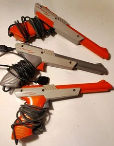 3 Vintage Original 1985 Nintendo NES Zapper Duck Hunt Gun NES-005 Orange & Gray - Picture 1 of 16