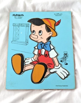Playskool vintage wooden puzzles "Pink Elephant, Kitten & Pinocchio" - Image 1 of 4