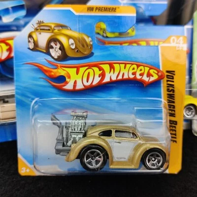 CARTA CORTA AUTO HOT WHEELS VOLKSWAGEN BEETLE GOLD HW PREMIERE 2010 4/52 1:64 - Immagine 1 di 4