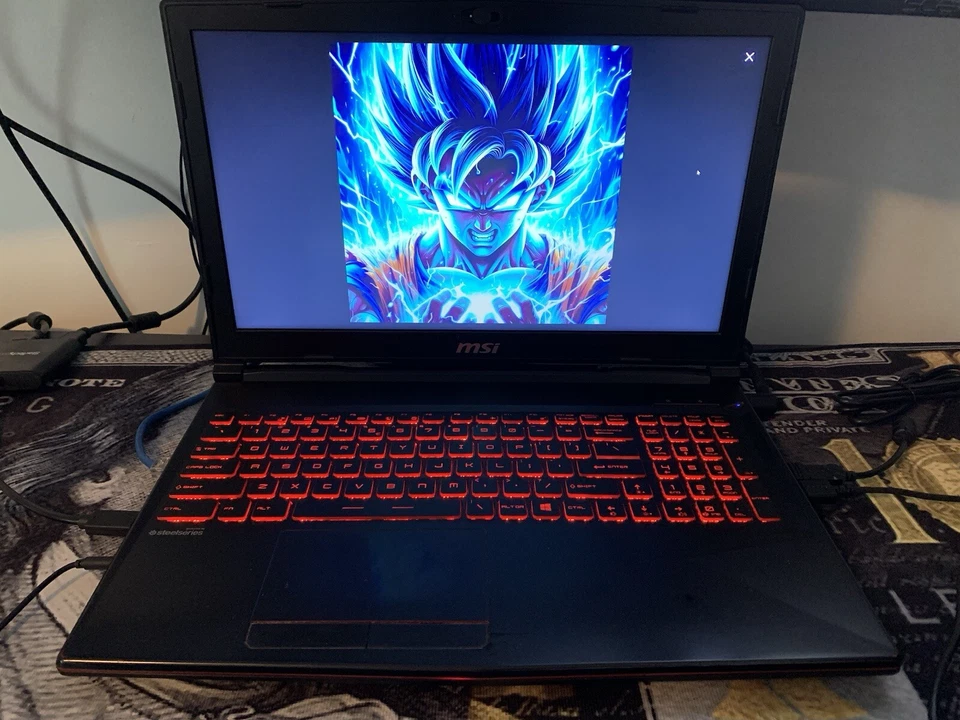 Portátil para juegos MSI GL63 15,6", Intel Core i5-8300H, NVIDIA GeForce GTX 1050 4 GB Foto 1 de 4