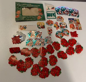 VTG Envelope Of 46 Christmas Seals Gummed Labels Diecut Santa Poinsettias - Picture 1 of 24