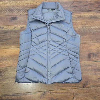 Chaleco acolchado North Face M para mujer talla mediana gris plata 550 relleno de plumón de ganso  Foto 1 de 4