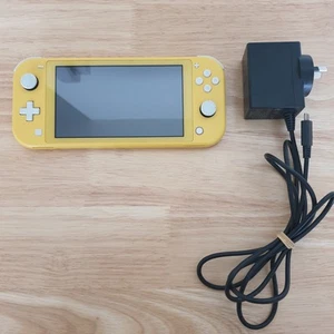 Nintendo Switch Lite 32GB Yellow Console - Picture 1 of 9