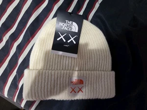 Kaws x The North Face TNF XX Beanie Moonlight Ivory Hat New With Tags Authentic - Picture 1 of 3