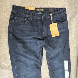 Jeans uomo Ring of Fire slim fit taglia 33 x 32 flex elasticizzato skinny Los Angeles - Foto 1 di 8