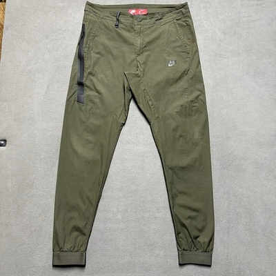 Calça Nike Masculina 36L Verde Tecnologia Tecido Ligado Jogger Max Taper 823363-325 Excelente Estado Usado - Imagem 1 de 4