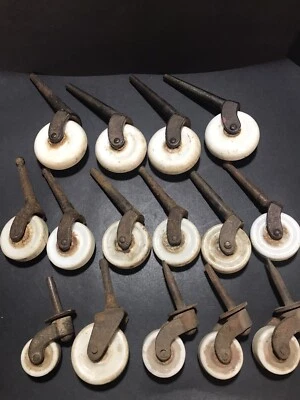 Lote vintage de (15) ruedas/ruedas para muebles de porcelana y hierro fundido usadas Foto 1 de 4