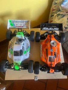 BUGGY 1/8 TEAM ASSOCIATED RC8B3,KYOSHO INFERNO MP9 RTR PIÙ MOTORI E RADIOCOMANDO - Foto 1 di 15