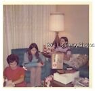 FOUND COLOR PHOTO F_9590 KIDS SITTING IN LIVING ROOM WITH PRESENTS