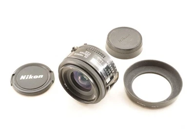 Lente principal gran angular Nikon AF NIKKOR 28 mm F/2,8 con capucha HN-1... - Imagen 1 de 4