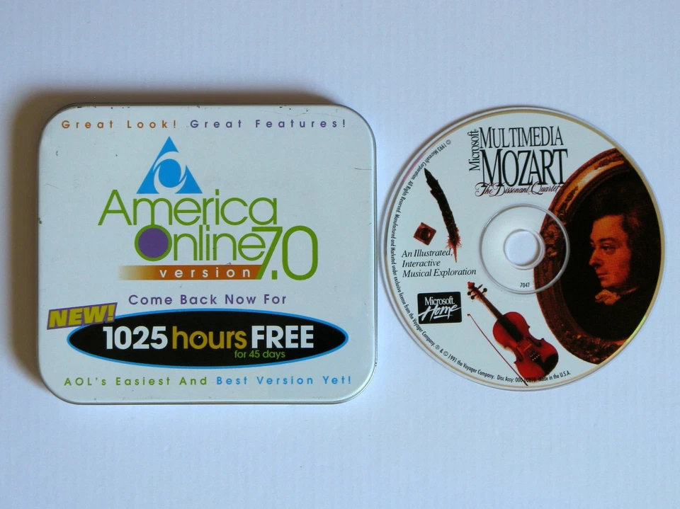 Vintage AOL Tin Container with Multimedia Mozart CD-ROM - Image 1 of 1