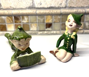 FIGURAS DE ELFO PIXIE DE CERÁMICA DE COLECCIÓN - NIÑA SENTADA, NIÑO LEYENDO EL AMOR - Imagen 1 de 6