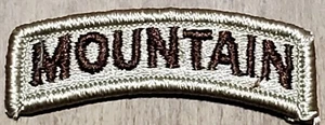 U.S. ARMY MOUNTAIN TAB PATCH - DESERT BDU TAN DCU ARC ROCKER NEW NOS ORG USGI - Picture 1 of 3