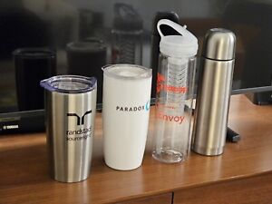 Group of Tumblers, water bottle with infuser, and thermos.