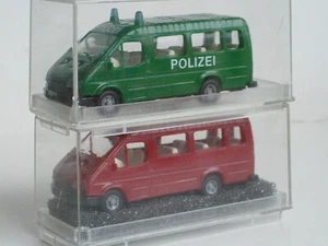 REVELL PRALINE 1:87 HO FORD TRANSIT MINIBUS X 2 - POLIZEI GREEN & RED - Picture 1 of 5
