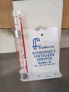 Antiguo anuncio de ascensor. Pluviómetro First Miss Inc Donahue's Fertilize Sheldon, Illinois - Imagen 1 de 4