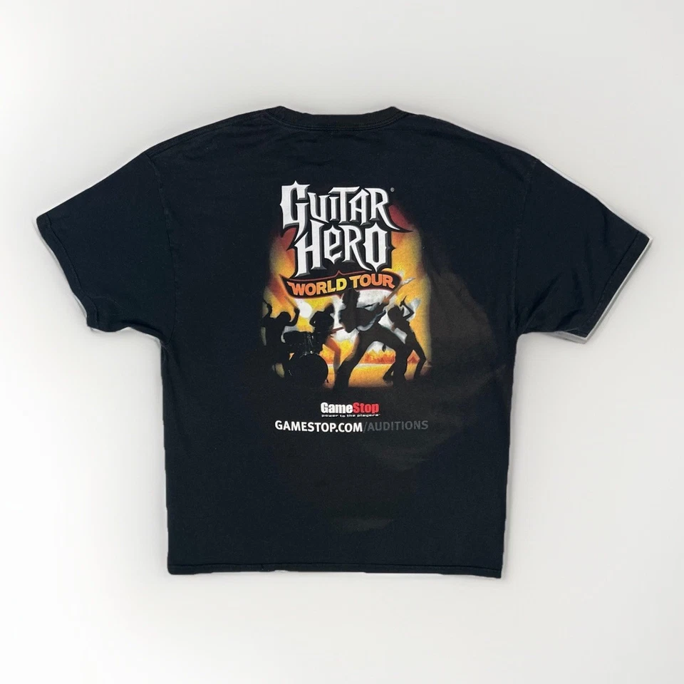 Camiseta Promo Guitar Hero World Tour GameStop 2009 Negra De Colección Hanes L Foto 1 de 4
