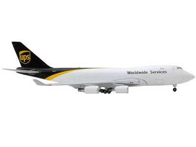 Avión comercial Boeing 747-400F "UPS Worldwide Services" blanco con marrón Ta Foto 1 de 2