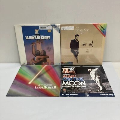 Lot of 4 Laser Videodisc Man on the Moon 1984 Olympics Pioneer Somewhere in Time - Image 1 of 4