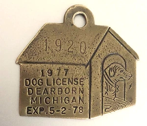 1977 Dog License Tax Brass Tag: DEARBORN MICHIGAN; Dog In The Dog House - Picture 1 of 1