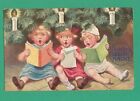 Vintage Tuck Wally Fialowska Christmas Postcard Girls With Books Sing Under Tree
